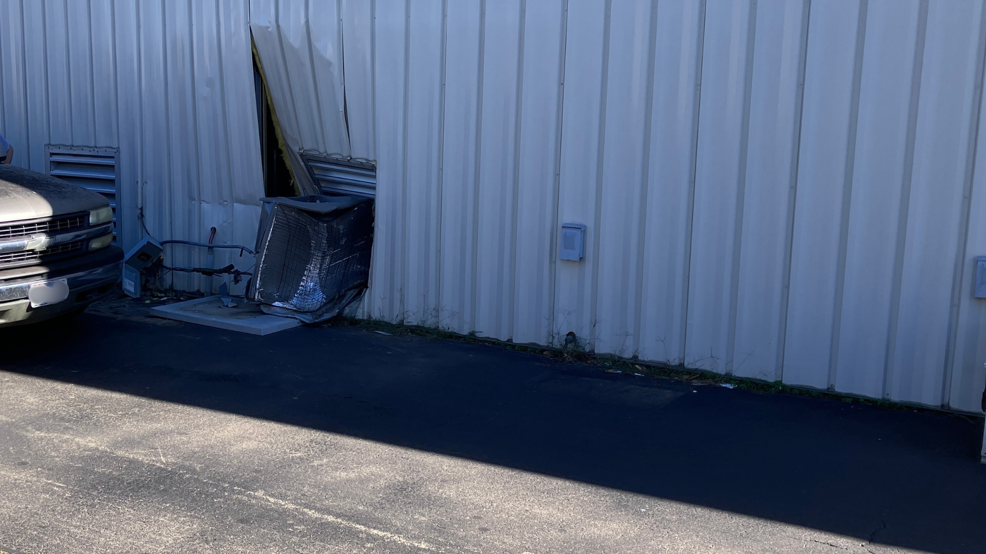 Truck Hits Side of Farmington Business